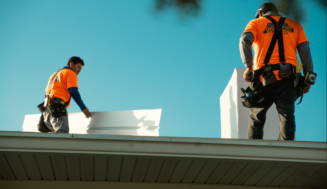 Ridgecap Roofing crew installing a new roof in Florida
